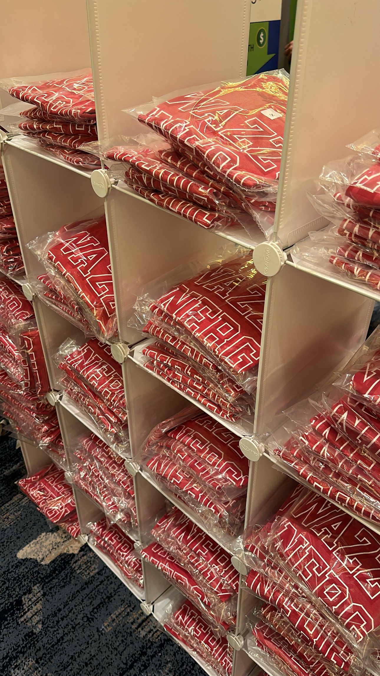 crimson t-shirts in a display